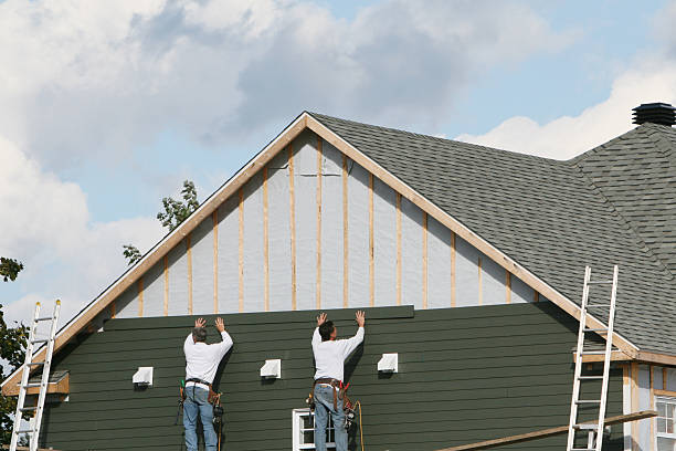 Professional Vinyl Siding technician working in Millis, MA